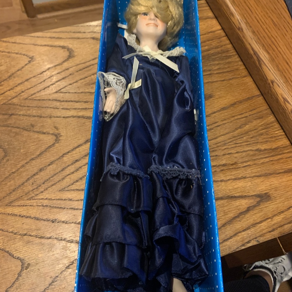 Charming Porcelain Doll in Navy Dress